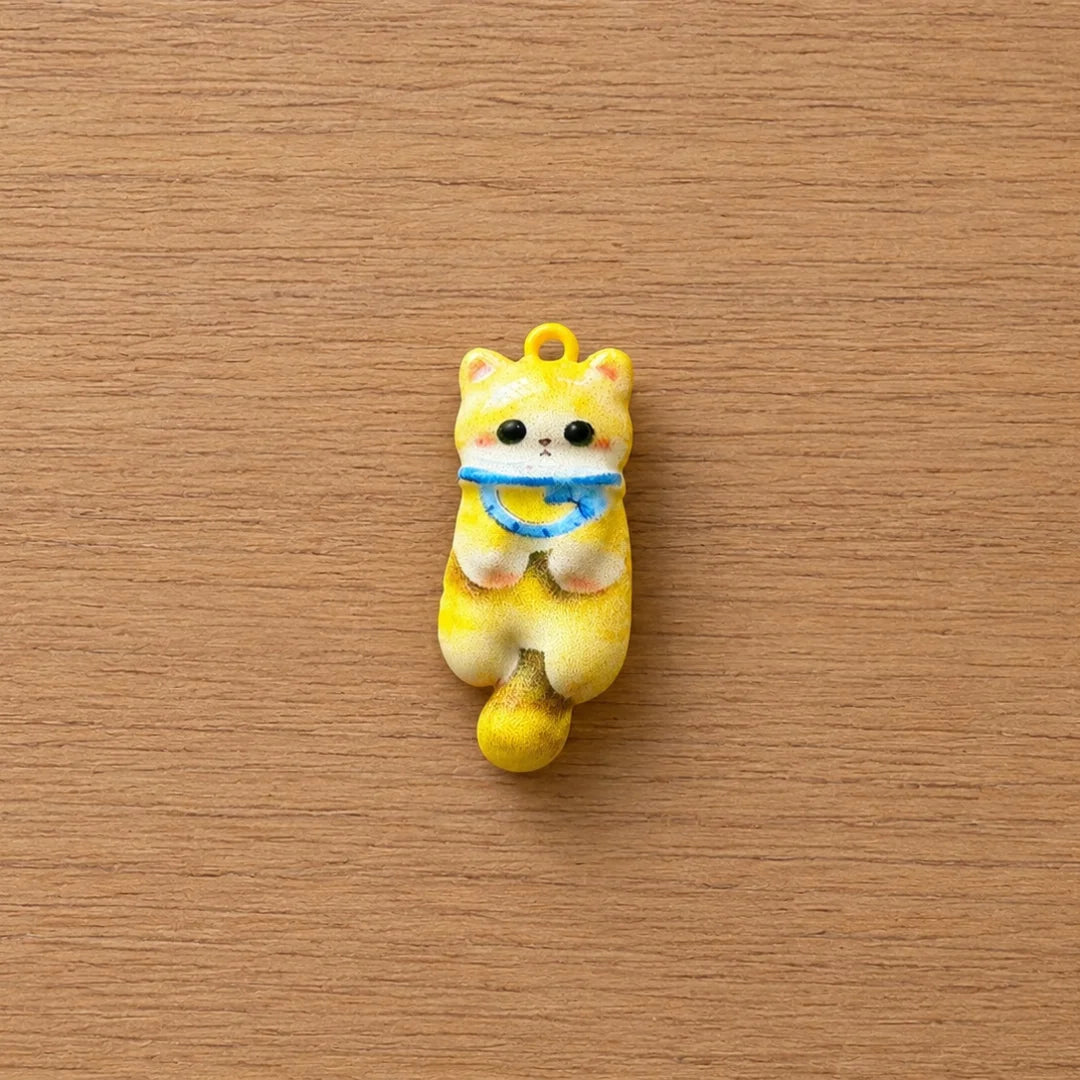 Yellow Kitten Wearing a Blue Scarf